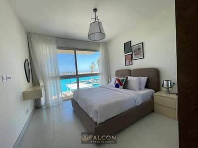 Chalet with panoramic lagoon view directly opposite Alamein Towers for sale with down payment of 185,000, next to Marina and marassi north coast
