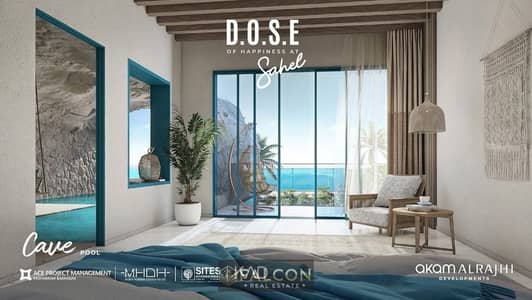 For sale: A fully finished luxury chalet in Dus Village featuring a panoramic lagoon view, available with a 10-year installment plan.