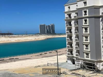 بمقدم 680الف !! استلم الان شقة بحري متشطب بالكامل فيو علي اللاجون ف الحي اللاتيني العلمين الجديدة الساحل الشمالي LATIN DISTRICT NORTH COAST