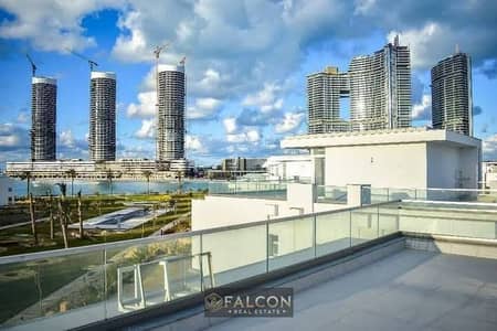 Apartment for sale with a lagoon view, 820,000 down payment, installments available, immediate occupancy, fully finished, VIP in Alamein, Mazreen