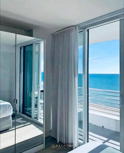 For sale: Chalet with lagoon and sea view, 400,000 EGP down payment + super deluxe finishing, in the North Coast, Seashore by Hyde Park.