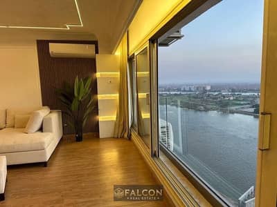 Hotel studio apartment with a high return of up to 5 million, on the Nile, first row in Maadi, immediate occupancy, finished with air conditioning and