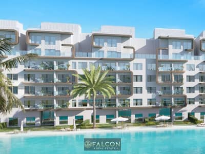 Chalet Direct on the lagoon, with a view of El Alamein Towers, with installments over 10 Y in Lagoons Al Alamein .