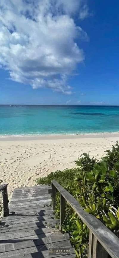 VIP hotel-style chalet with a master bedroom (including a dressing room) and a private beach at Rixos; ready for immediate handover, fully finished an