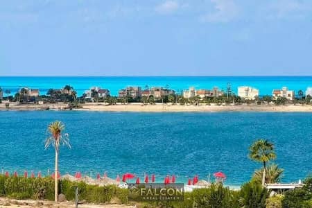 Hotel chalet with 100% sea view from all directions, steps from the sea in Marina, the heart of New Alamein.