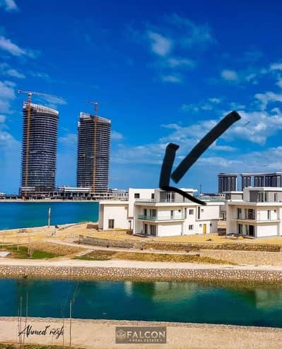 Prime location villa with a private lake and beach on the Alamein coast. Immediate delivery, fully finished, and 12-year installments.