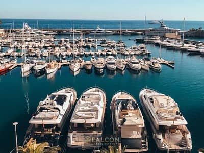VIP chalet in Marina 8 BY THE LAKE, first row in the heart of New Alamein with a view of the towers, installments available.