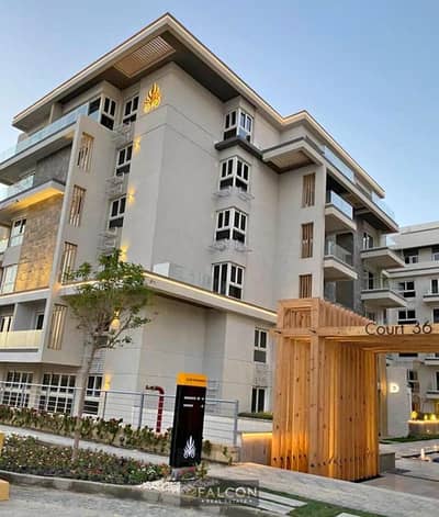 with 40% Discount Recieve immediately a Ready to Move  Apartment with Garden in the Heart of Golden Square Besidr Mivida & THe AUC in i-City New Cairo