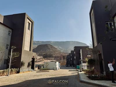 With 25% Discount Recieve immediately a Ready To Move & Fully Finished 2BR Chalet On The Pool With Sea View in Jebal Al Sokhna