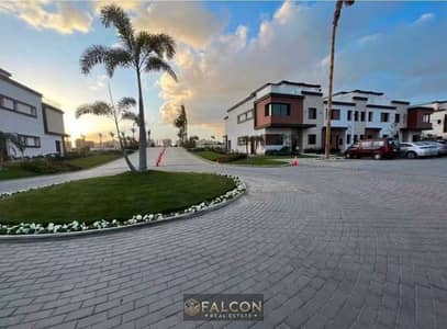 with 33% Discount Own a Corner Town House Cheaper than Apartment Beside the Middle Ring Road & Sokhna Road in Azzar Compound , 6th Settlement