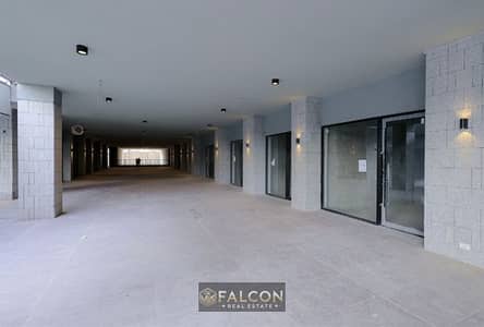 Only 910,000 EGP for immediate sale next to City Stars Mall on Nozha Street, above Traffic Mall in Nasr City. 70 sq m shop with a full storefront on a
