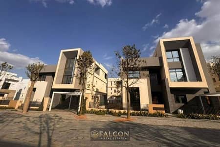Three-story villa directly on the New Suez Road, ready for viewing in Saada Compound, Fifth Settlement, New Cairo.
