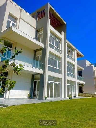 Immediate receipt , super deluxe finishing, lagoon view, apartment for sale in Mazarine next to El Alamein Towers and marina