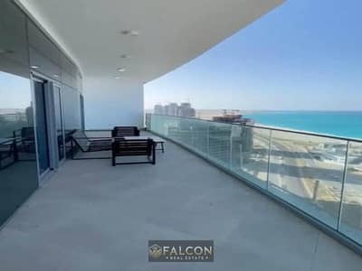 Take immediate possession of a fully finished apartment for sale in Alamein Towers, featuring an open sea view and located near Marassi and Hacienda B