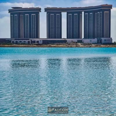 استلم فوري شقتك بتشطيب VIP بأميز لوكيشن واقل سعر في قلب ابراج العلمين  بفيو خيالي علي ناطحة السحاب واقساط حتي 12 سنة