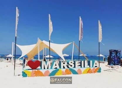شاليه استلام فوري بتشطيب High End جاهز سي فيو كامل قسط في مارسيليا بيتش 5 الساحل الشمالي - Marseilia Beach 5