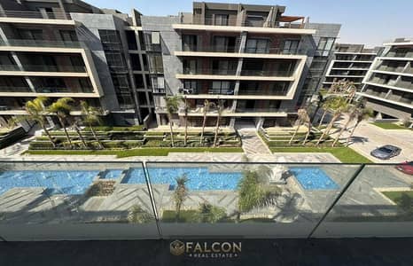Near AUC, a corner apartment on a typical floor with a sea view, in the heart of New Cairo, with La Vista Patio. Installment plan with no interest.