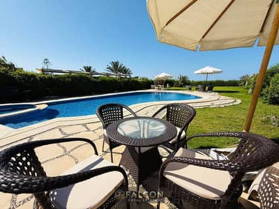 Ground floor chalet with garden, 149m² + 108m² garden, unobstructed sea view, for sale in Marina 8, New Alamein, North Coast, near Alamein Towers and