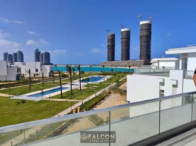Chalet Ready to move in Mazarine, New Alamein, overlooking Alamein Towers + Lagoon, High-end finishing, sea view, minutes from Alamein Airport