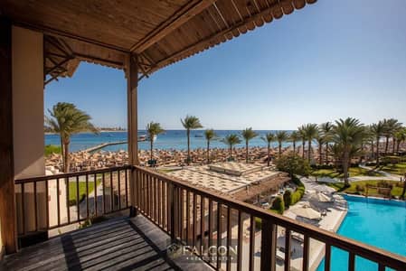 Opportunity to invest with Hassan Alam Chalet for sale (finished + with kitchen + air conditioners + with cupboards) on the sea in Swan Lake El Gouna