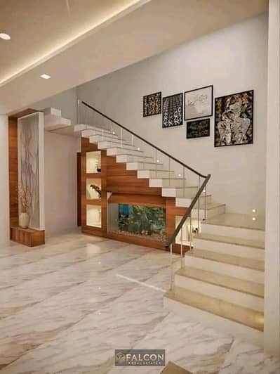 Two-story villa for sale in New Cairo with a 50% discount and installment plan available.