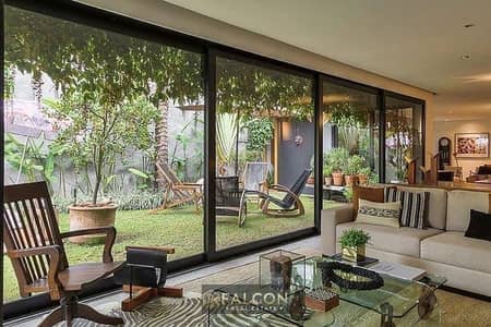Ground-floor unit with a garden in Sarai Compound; available with a 1.5% down payment and a 12-year installment plan, fea