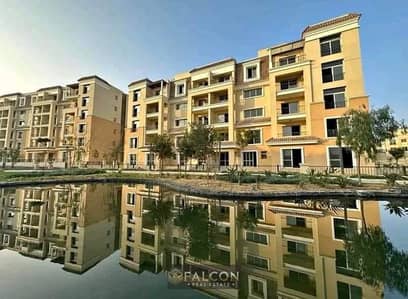 Two-bedroom apartment with a direct view of the landscape, 100 square meters, with a distinctive layout, for sale in Sarai Compound, next to Madinaty