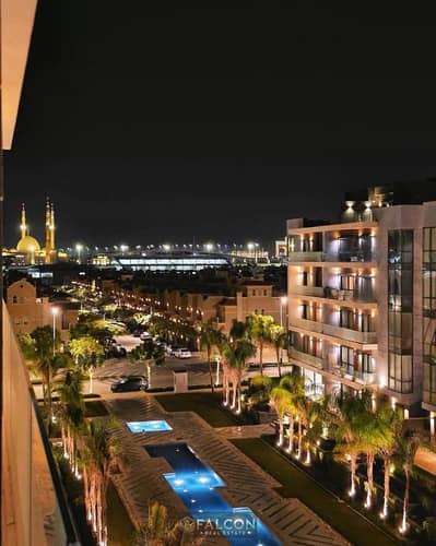 Ready-to-move-in apartment with a lagoon view and sea frontage, available for viewing in La Vista Al Patio Oro Compound - Fifth Settlement
