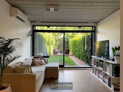 Fully finished apartment with garden, lagoon & landscape view for sale for up to 15 years in Talala Compound in New Heliopolis, opposite Madinaty