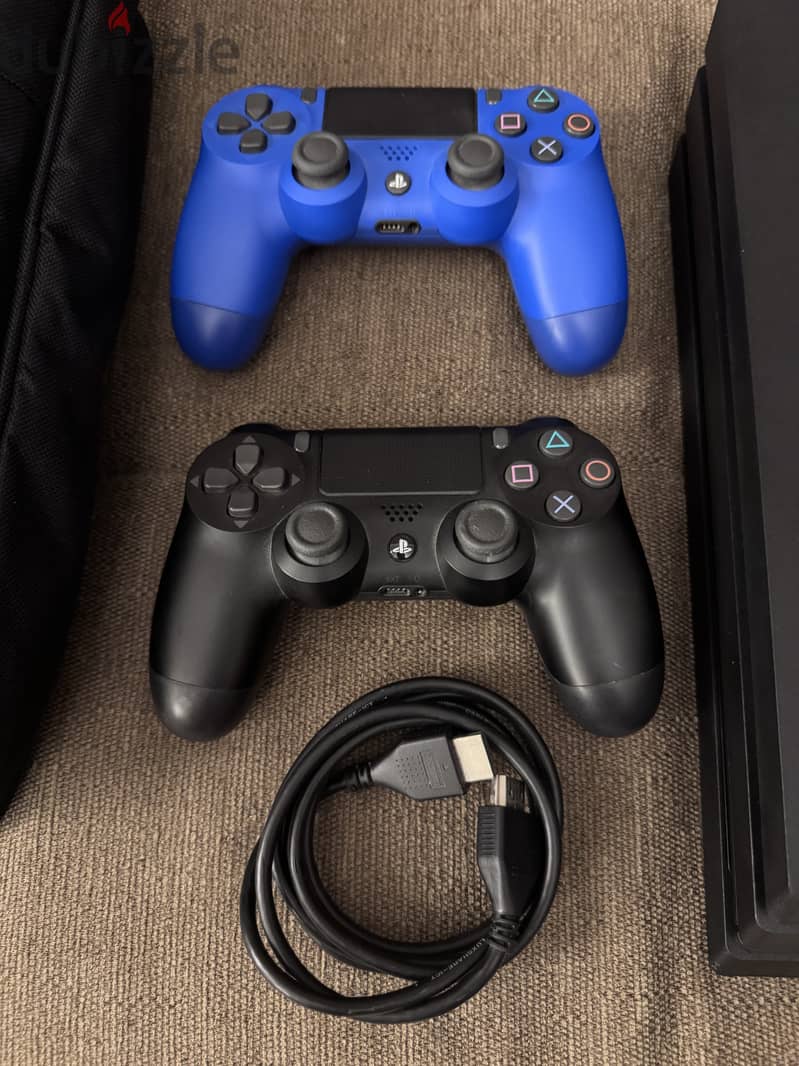 PlayStation 4 Pro - UAE Version - Like New Condition -Full Accessories 2