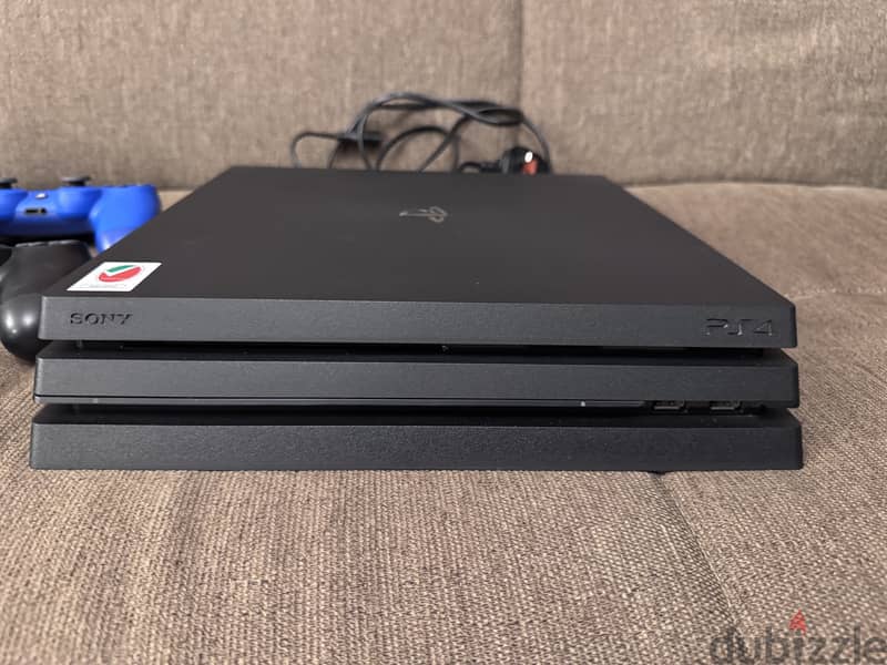 PlayStation 4 Pro - UAE Version - Like New Condition -Full Accessories 6