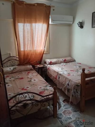 Apartment for rent in Zahra Maadi in front of the traffic department, air-conditioned, area of 130m consisting of 3 rooms, reception, kitchen, bathroom, floor 5, there is an elevator, super lux finishing, fully furnished
