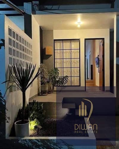 townhouse villa for sale , "completely finished" | in a compound with full services and facilities | bloom fields | New Cairo | Tatweer