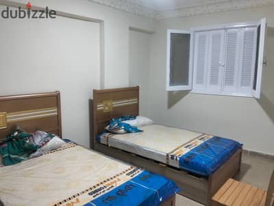 Furnished apartment with new furniture for annual rent, suitable for families, couples, or companies. 2 bedrooms, reception, kitchen, bathroom, on the third floor, very comfortable stairs. All facilities available: water, electricity, and natural gas, located in Alexandria, Al-Ajami, kilometer 21, next to Al-Suhaji cafeteria in a very distinguished location.