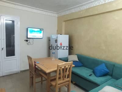Furnished apartment with new furniture for annual rent, suitable for a family, a groom, or a company. 2 bedrooms, reception, kitchen, bathroom, on the third floor, upper level, very comfortable stairs. All utilities available: water, electricity, and natural gas. Located in Alexandria, Al Agamy, Kilometre 21, next to Al-Suhaji Café in a very distinguished location.