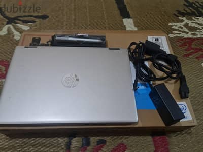 Hp pavalion x360 معاه القلم الاصلي والشاحن الاصلي والكرتونه بتاعته