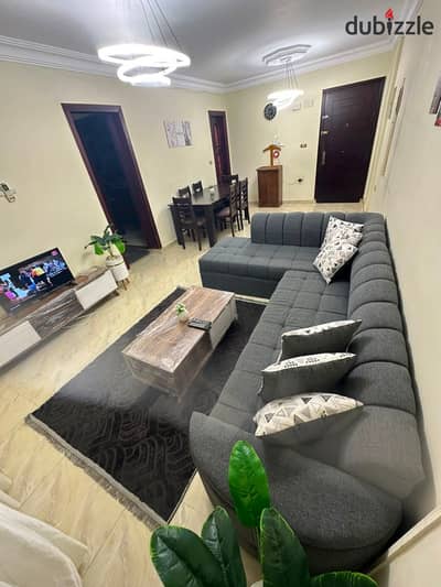 At a very affordable price, a furnished apartment for rent in Madinaty, ground floor with a garden