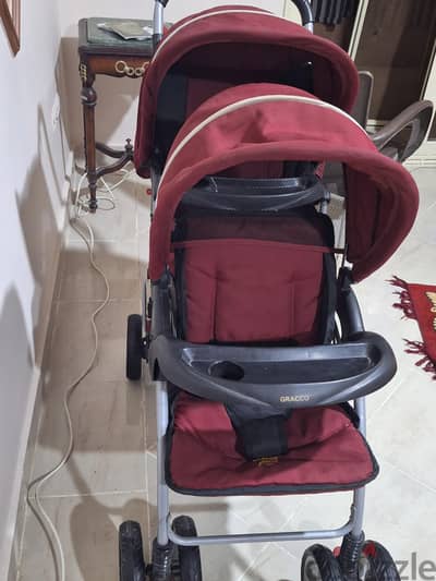 عربة أطفال توينز