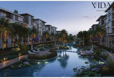 apartment for sale 103 sqm in Tesla Island located directly on Al Wahat Road Only 10% down payment with installments for up to 10 years
