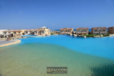 شاليه للبيع بسعر لقطه دبل فيو على الللاجون والبحر بخصم كبير على الكاش بتشطيب vip خطوات من اللاجون ف تلال السخنه بجوار بورتو السخنه ولافيستا