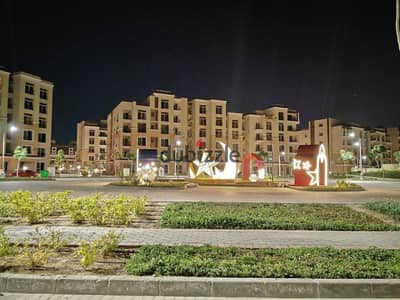 Apartment for sale with a large garden in Sarai Compound located directly adjacent to Madinaty on the Suez Road  A 50% discount applies for cash