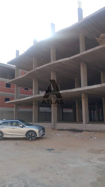 Land for sale, neighborhood 26, Spanish, adjacent to 4, area 880 meters in the tenth of Ramadan