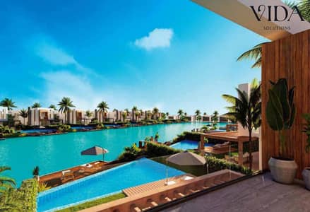 شاليه للبيع في هاسيندا باي بالم هيلز - استلام صيف 2027 - ارضي بجاردن علي البول