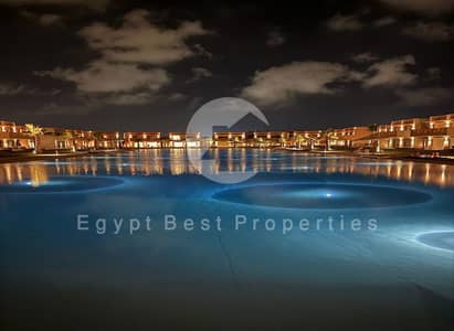 Direct lagoon view ready to move downpayment and installments fully finished Twin villa for sale in Playa Ghazala North coast