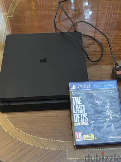 PS4 Slim 500gb- no controller- perfect condition + last of us