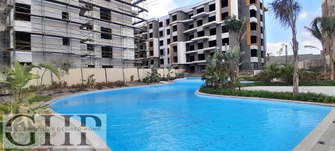 استوديو فيو مباشر على اللاجون تشطيب كامل للبيع في بالم هيلز التجمع الخامس Palm hills new cairo