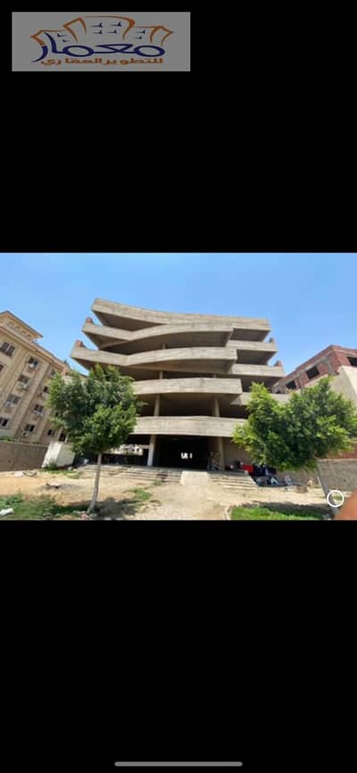 فرصه للسكن او للاستثمار عمارة للبيع دبل فيس على حديقه على محور جمال عبدالناصر ارتفاع 5 اداور  بسعر مغرى