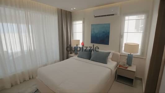 fully finished chalet  ready to move First row sea view for sale with prime location in  New Alamein, North Coast.
