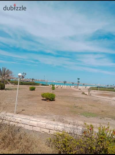 "The Luxury of Distinction & Panoramic Views | Sea-Facing Villa for Sale: First Line on the Sandy Lagoon & Sea – Marina 4, North Coast"