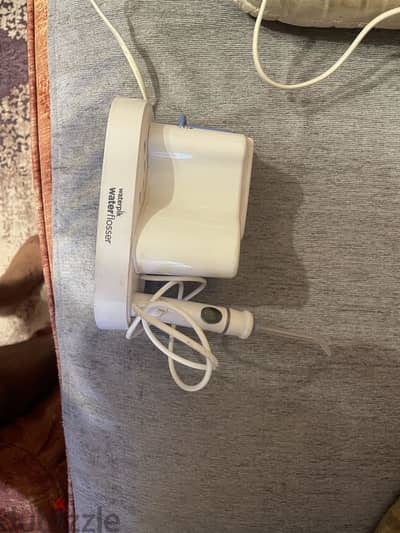 Waterpik جهاز تنضيف الاسنان بالمضخه من ووتربيك